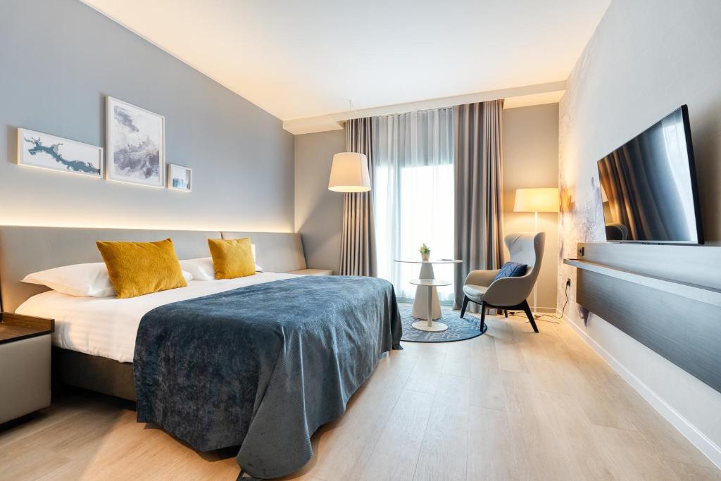 Postel nebo postele na pokoji v ubytování Van der Valk Hotel Spa