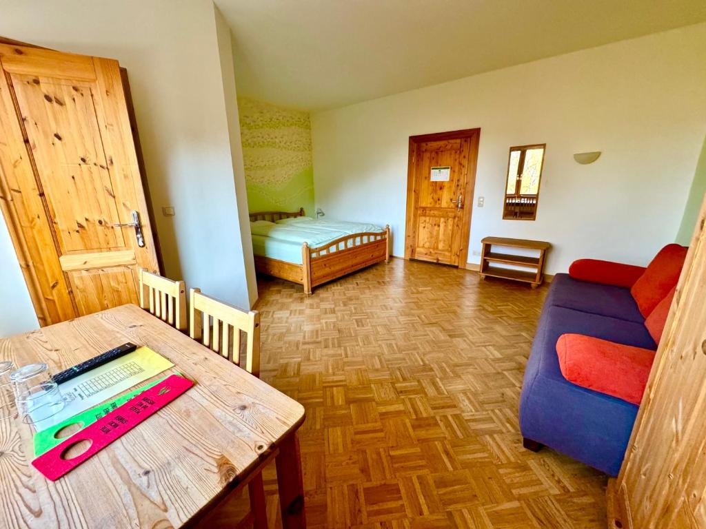 Postel nebo postele na pokoji v ubytování Hotel Grünwald