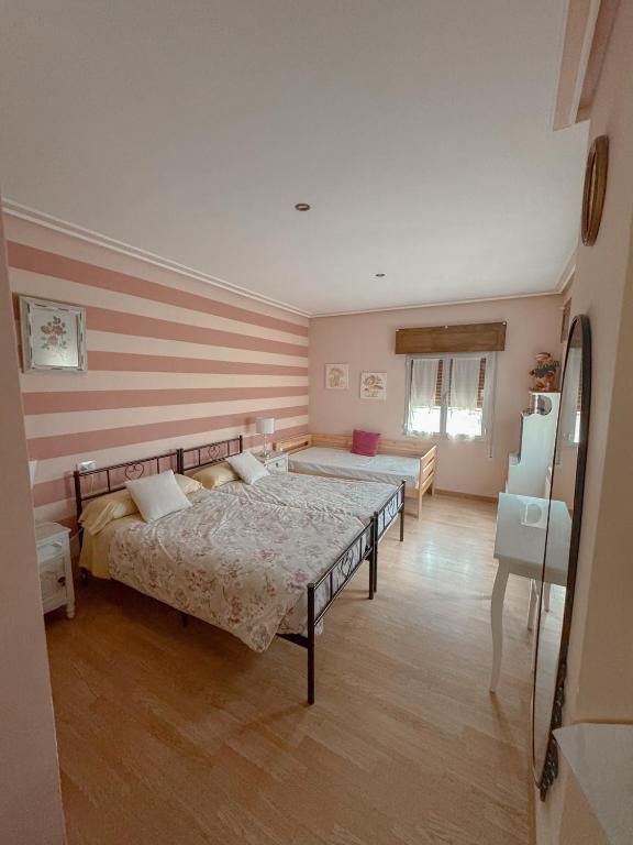 Posteľ alebo postele v izbe v ubytovaní Casa Idalia