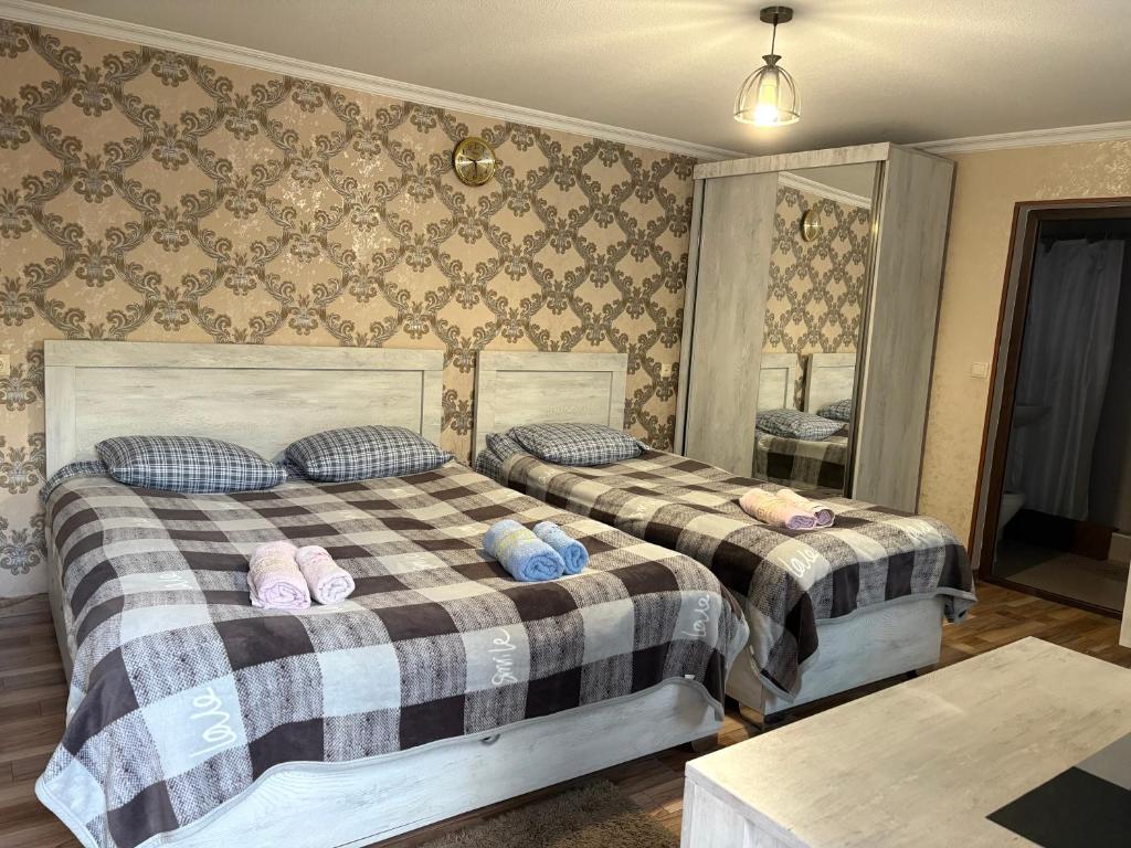 Postel nebo postele na pokoji v ubytování Guesthouse Saba