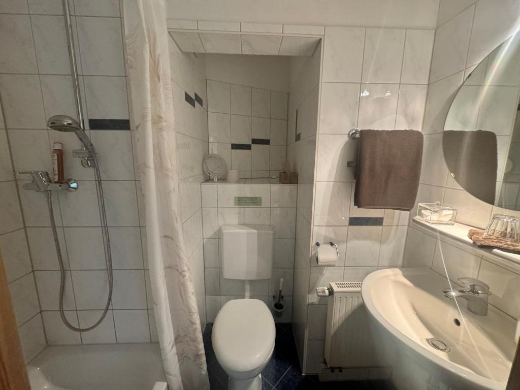 Koupelna v ubytování Hotel Grünwald