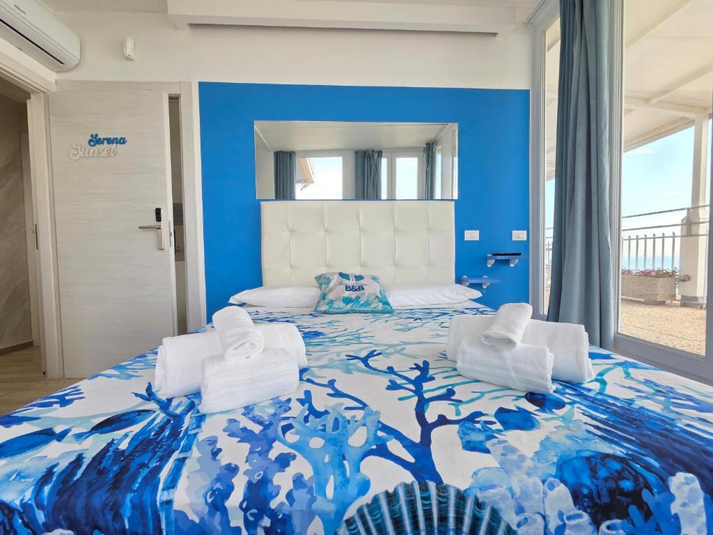 Postel nebo postele na pokoji v ubytování Suite Torre Azzurra B&B - Rooftop Sea View