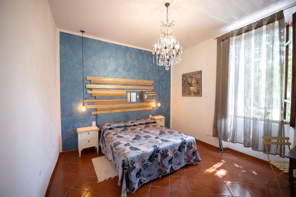Postel nebo postele na pokoji v ubytování Residenza Moore