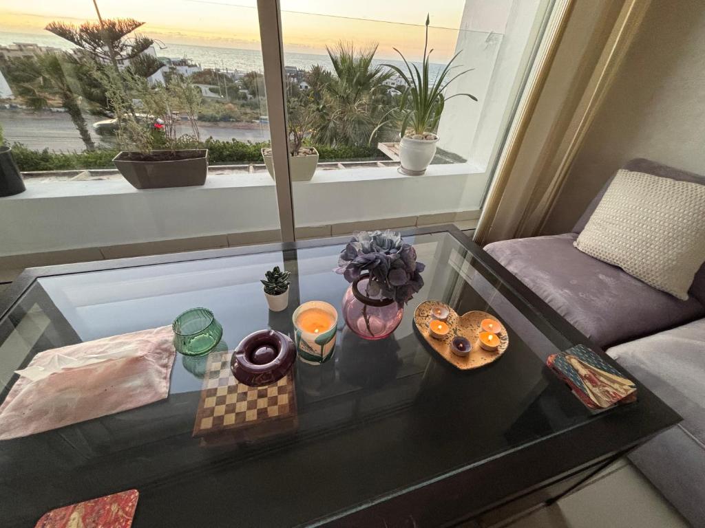 Coin salon dans l'établissement Melrose Beach - Apartment with a beach view