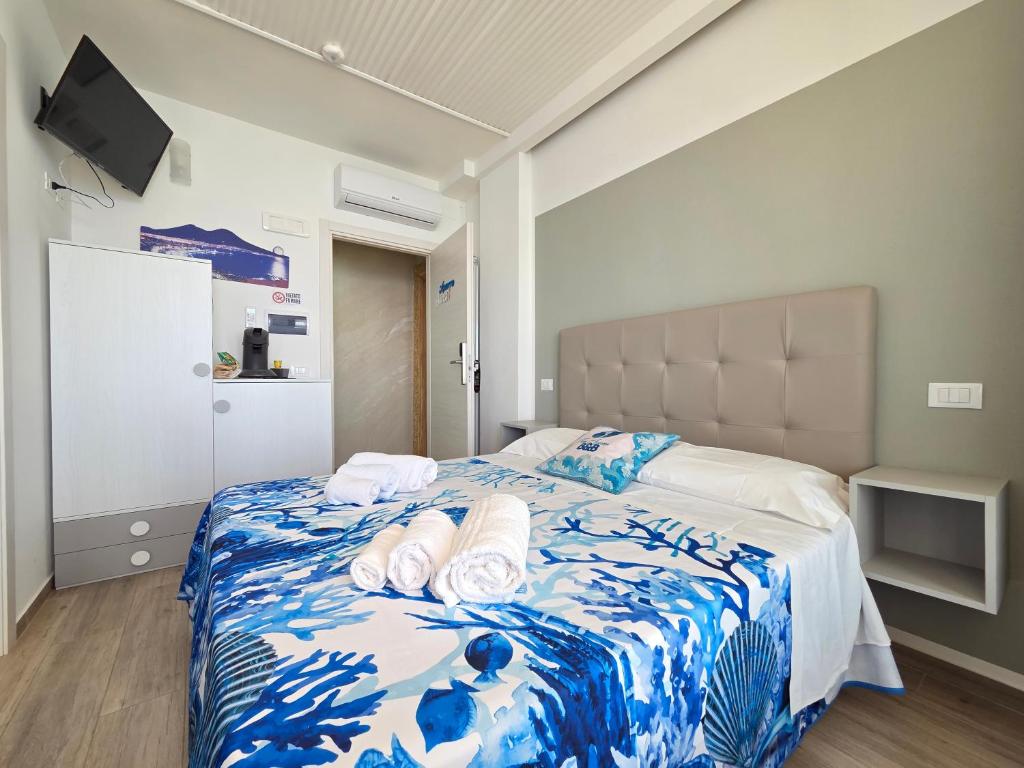 Postel nebo postele na pokoji v ubytování Suite Torre Azzurra B&B - Rooftop Sea View