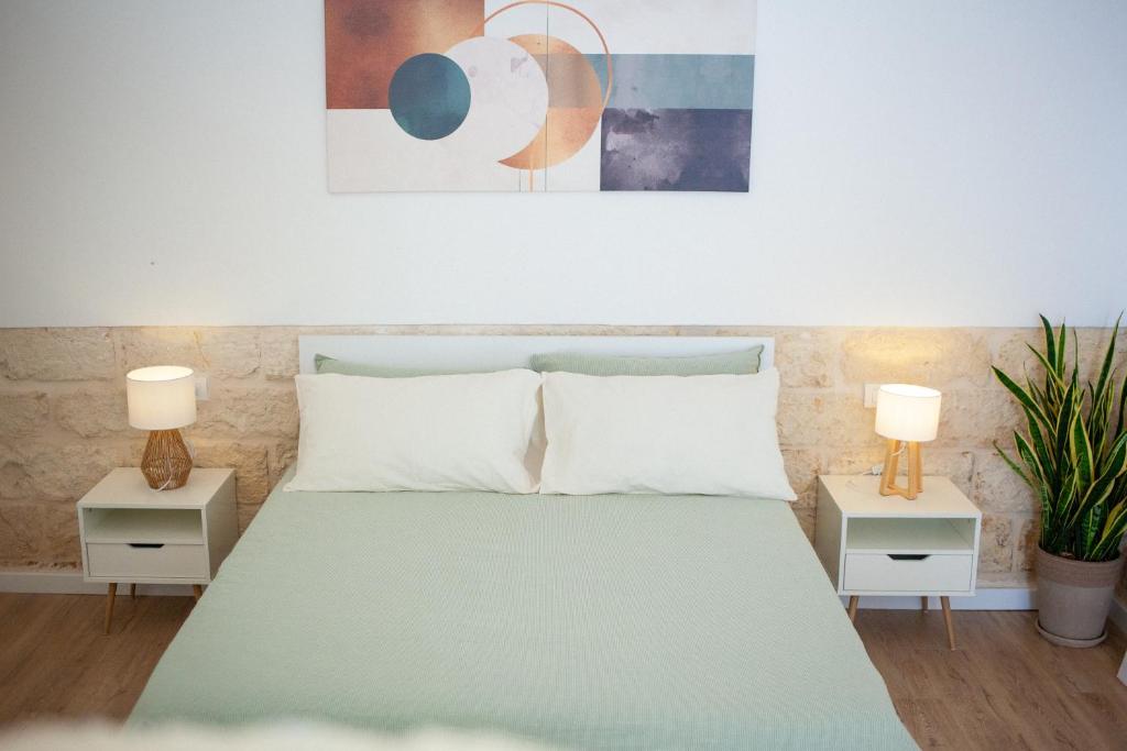 Postel nebo postele na pokoji v ubytování Casa Tonì