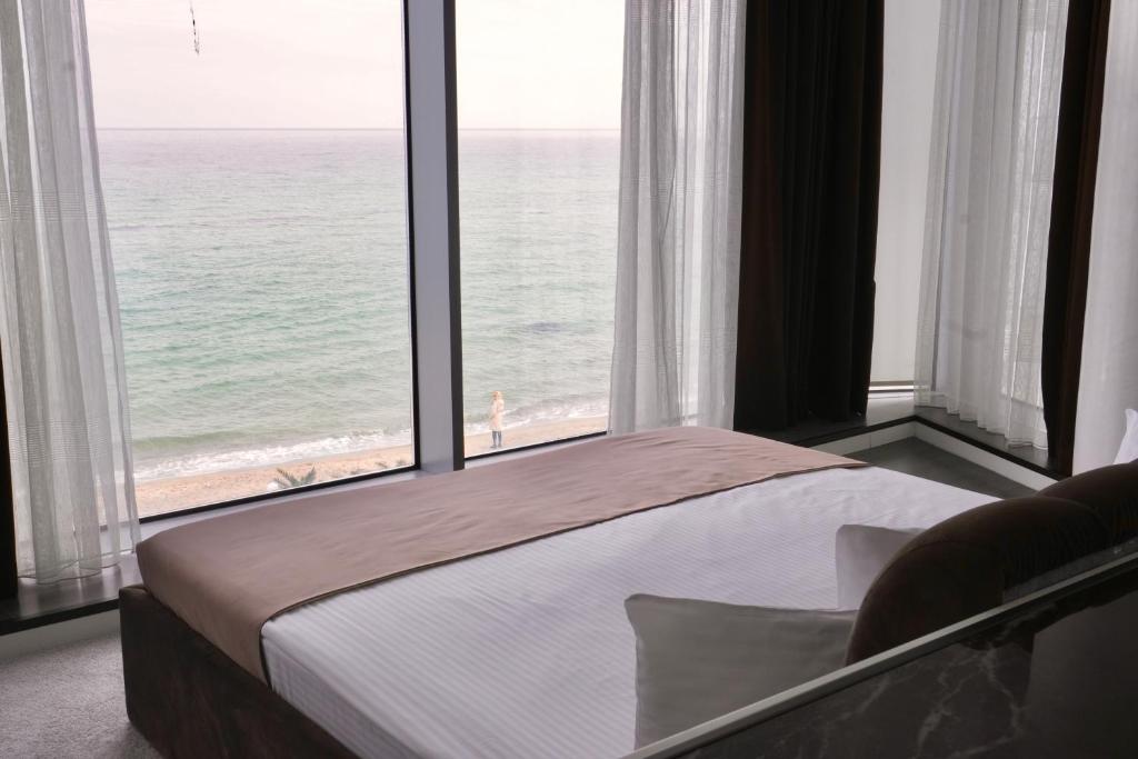 Postel nebo postele na pokoji v ubytování Boutique Hotel Portofino