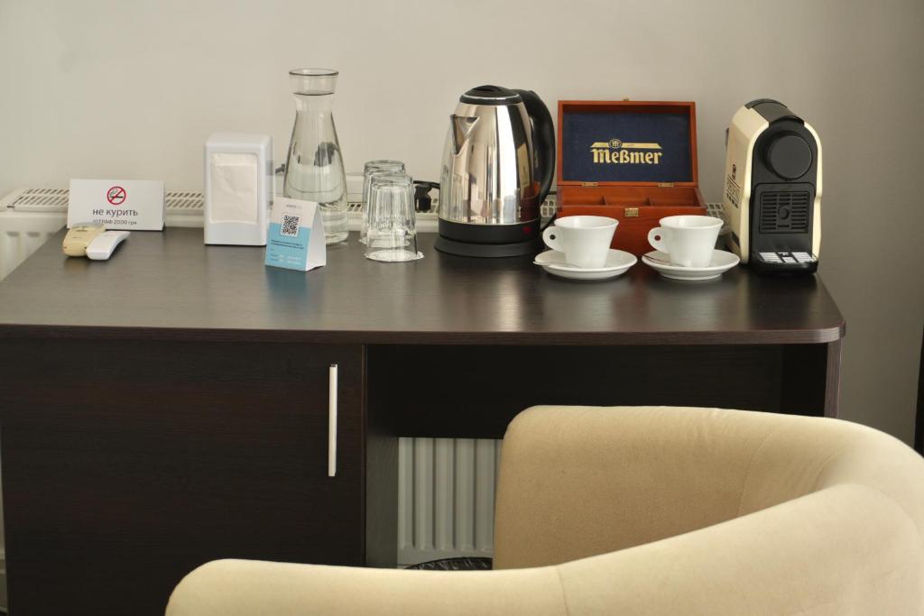 Příslušenství pro přípravu čaje a kávy v ubytování Boutique Hotel Portofino
