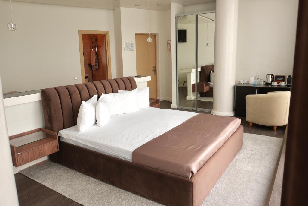 Postel nebo postele na pokoji v ubytování Boutique Hotel Portofino