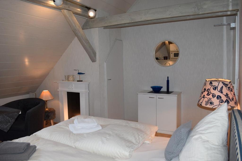 Postel nebo postele na pokoji v ubytování Landhaus Bornemann