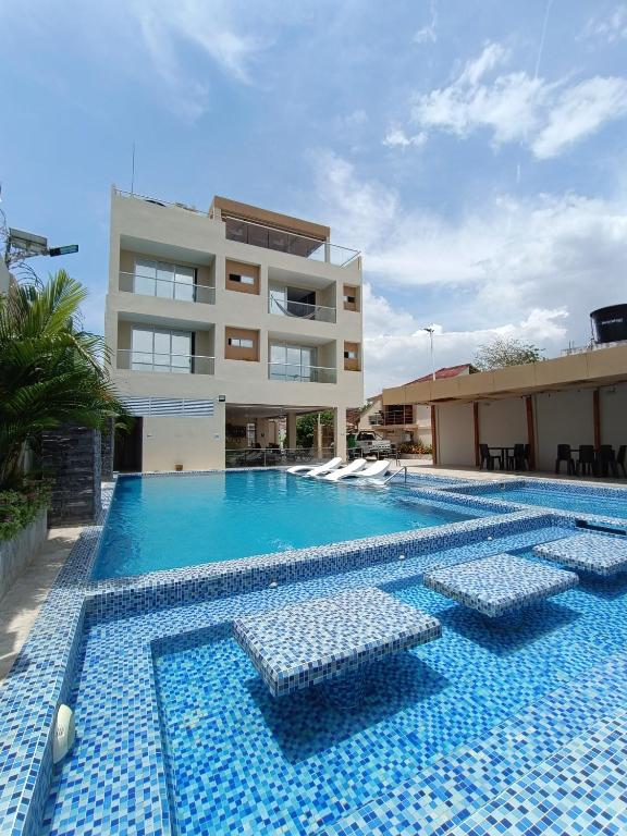 Bazén v ubytování Hotel y Cabañas Covemar nebo v jeho okolí