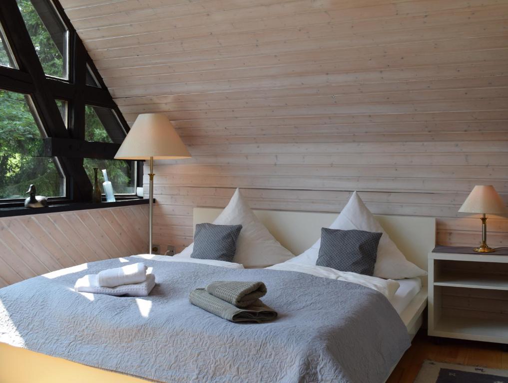 Postel nebo postele na pokoji v ubytování Landhaus Bornemann