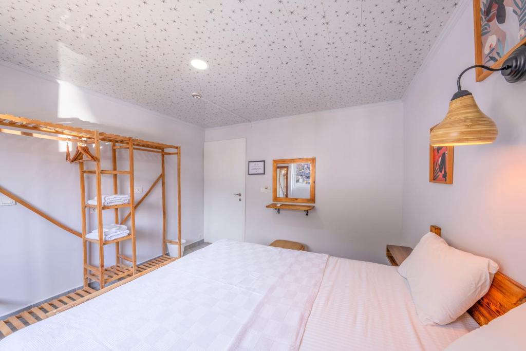 Postel nebo postele na pokoji v ubytování Larex Otel