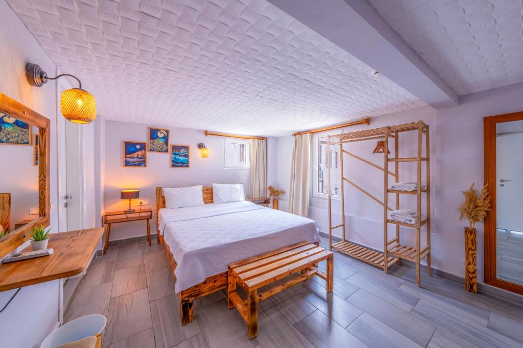 Postel nebo postele na pokoji v ubytování Larex Otel
