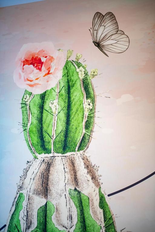 a drawing of a dress and a butterfly at Dimora Nesea in Cozze