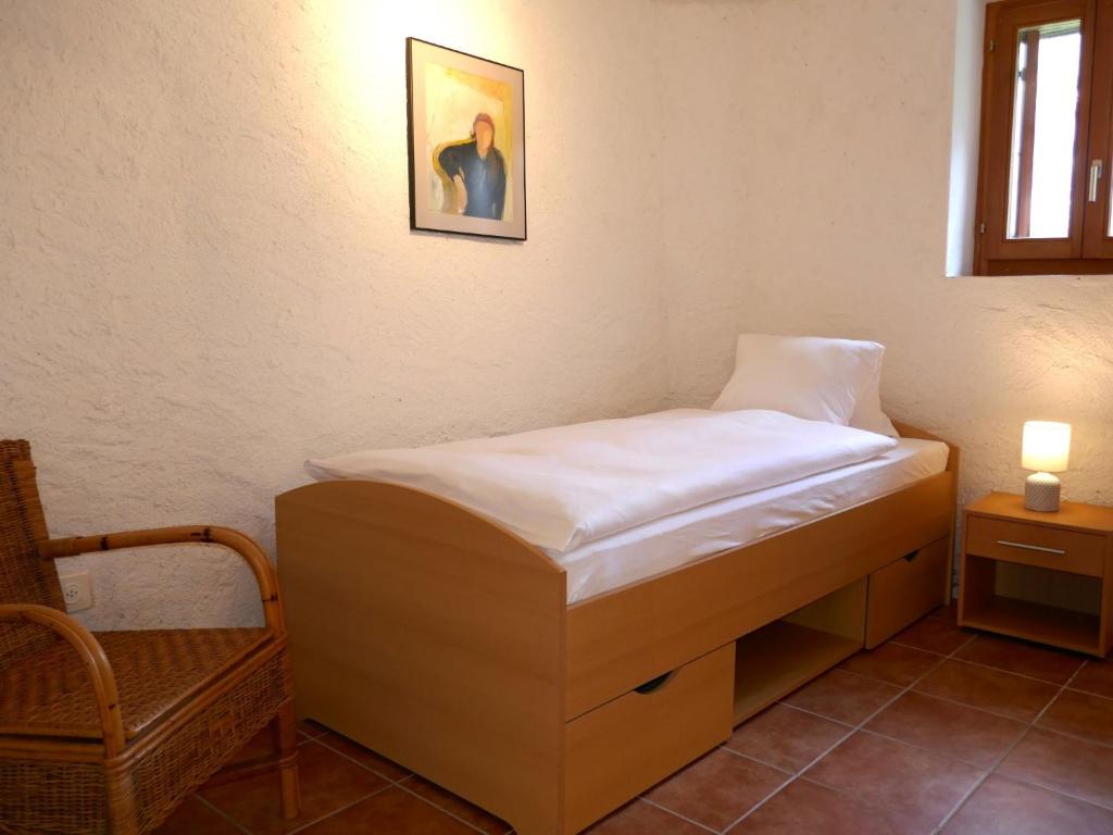 Postel nebo postele na pokoji v ubytování Holiday Home Rustico Carcarida by Interhome