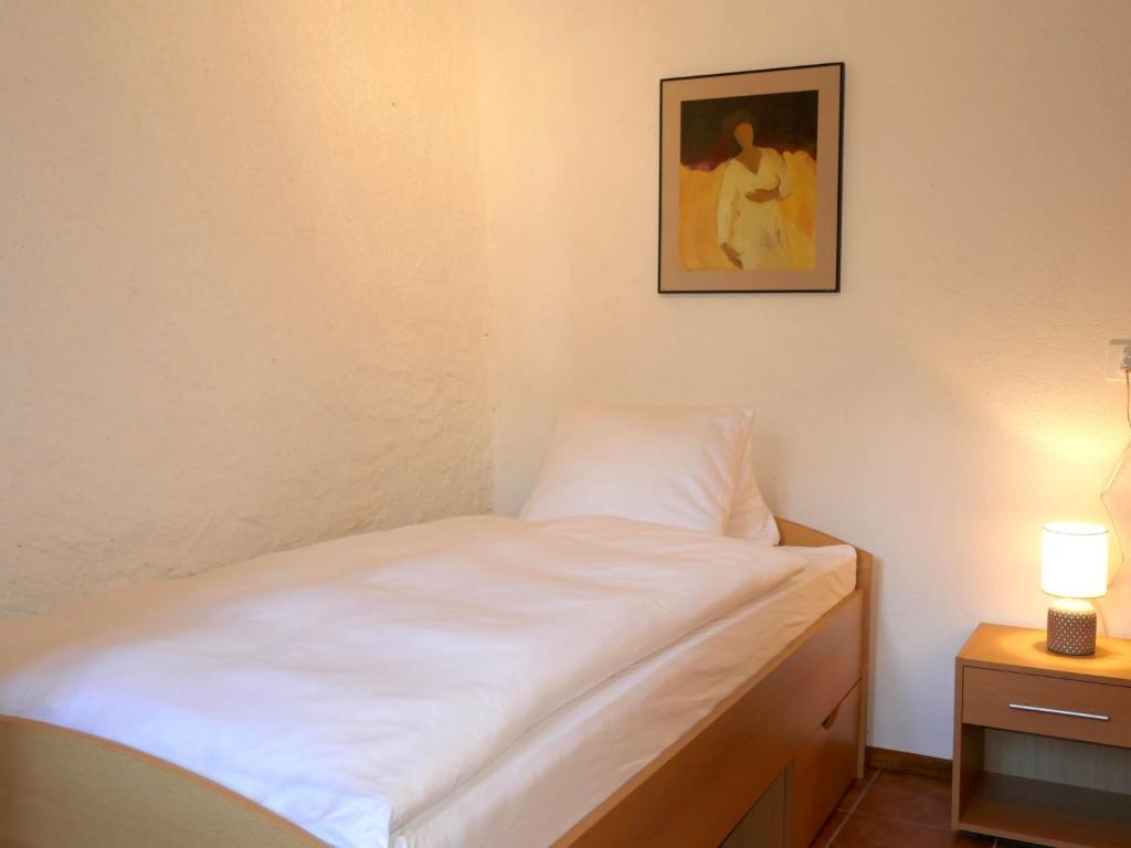 Postel nebo postele na pokoji v ubytování Holiday Home Rustico Carcarida by Interhome