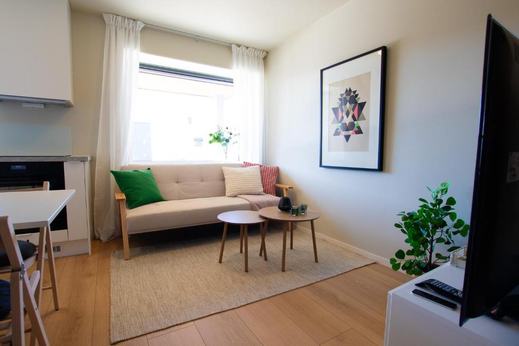 TV a/nebo společenská místnost v ubytování Apartment close to nature and the city