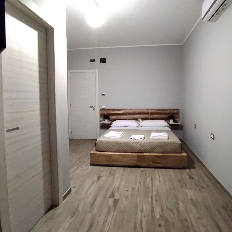 Postel nebo postele na pokoji v ubytování Pietrapantone B&B