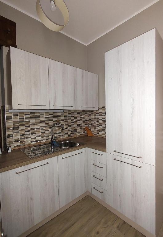 Kuchyň nebo kuchyňský kout v ubytování Pietrapantone B&B