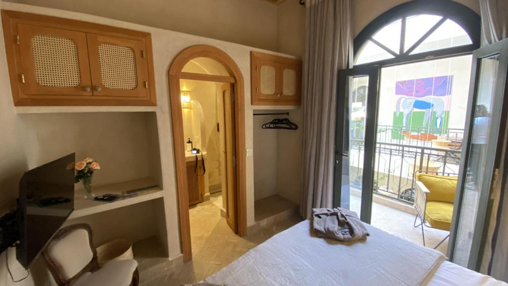 Postel nebo postele na pokoji v ubytování Maison Riad Beryll