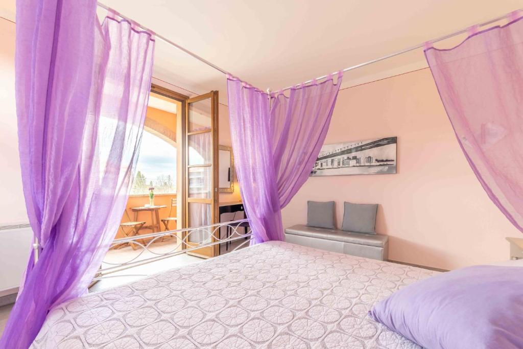 Postel nebo postele na pokoji v ubytování Casa Cardinali