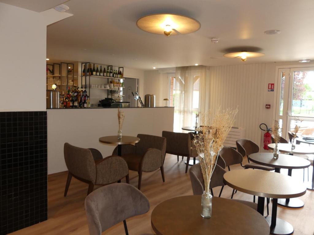 Posezení v ubytování Brit Hotel Confort Alençon