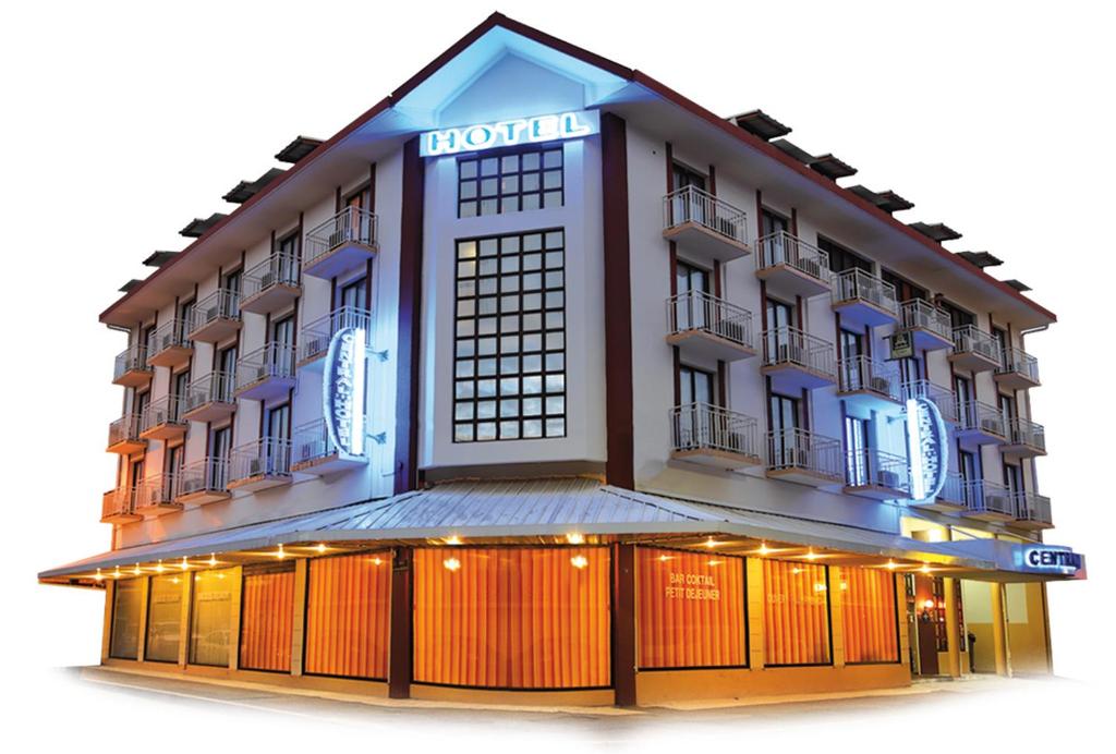 a rendering of a hotel with a building at Central Hotel Cayenne in Cayenne