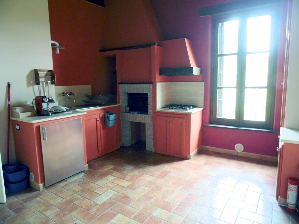 Kuchyň nebo kuchyňský kout v ubytování Le Case Gialle Resort