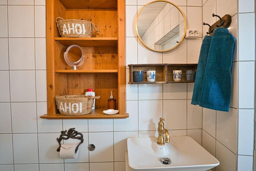 Koupelna v ubytování Friedrichstadtnixe, meerchenhaftes Haus mit Sauna