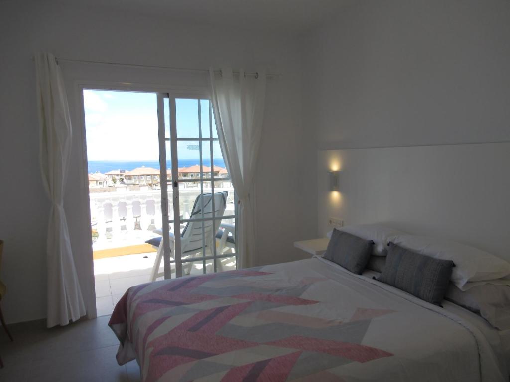 Posteľ alebo postele v izbe v ubytovaní SOMETHING SPECIAL LAS DUNAS 9 by RENTMEDANO pretty villa with sea view and pool