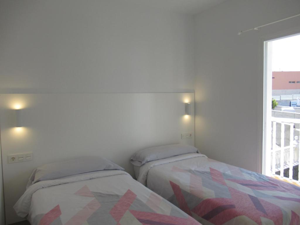 Posteľ alebo postele v izbe v ubytovaní SOMETHING SPECIAL LAS DUNAS 9 by RENTMEDANO pretty villa with sea view and pool