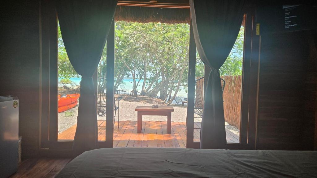 Postel nebo postele na pokoji v ubytování Playa Laguna Bacalar Beach Front