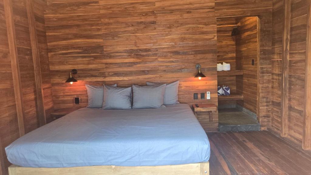 Postel nebo postele na pokoji v ubytování Playa Laguna Bacalar Beach Front