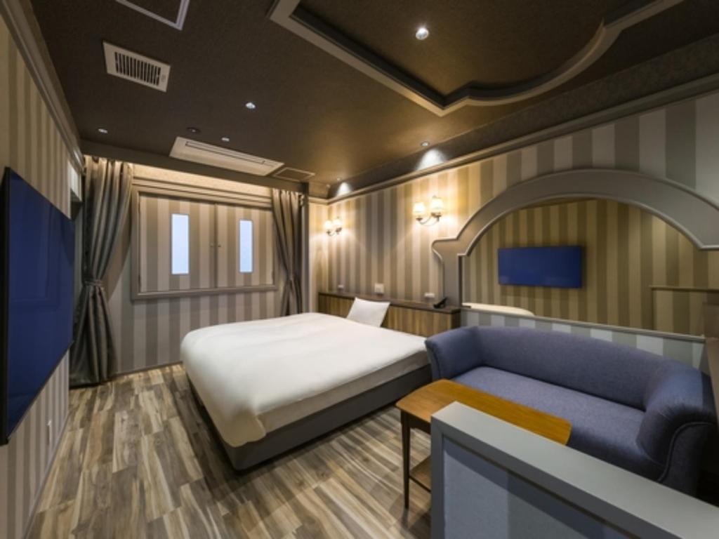 Ένα ή περισσότερα κρεβάτια σε δωμάτιο στο HOTEL Noir Blanc - Vacation STAY 18087v