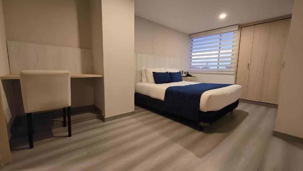 Postel nebo postele na pokoji v ubytování Hotel Confort 80 Zona Rosa