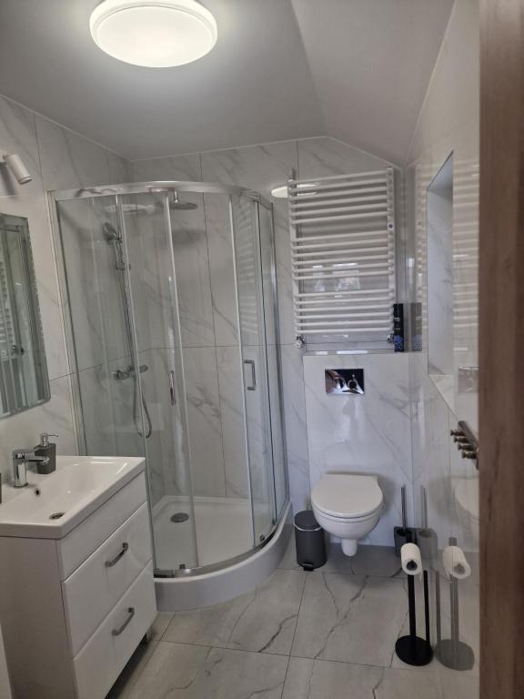 Kúpeľňa v ubytovaní Apartamenty Mazury