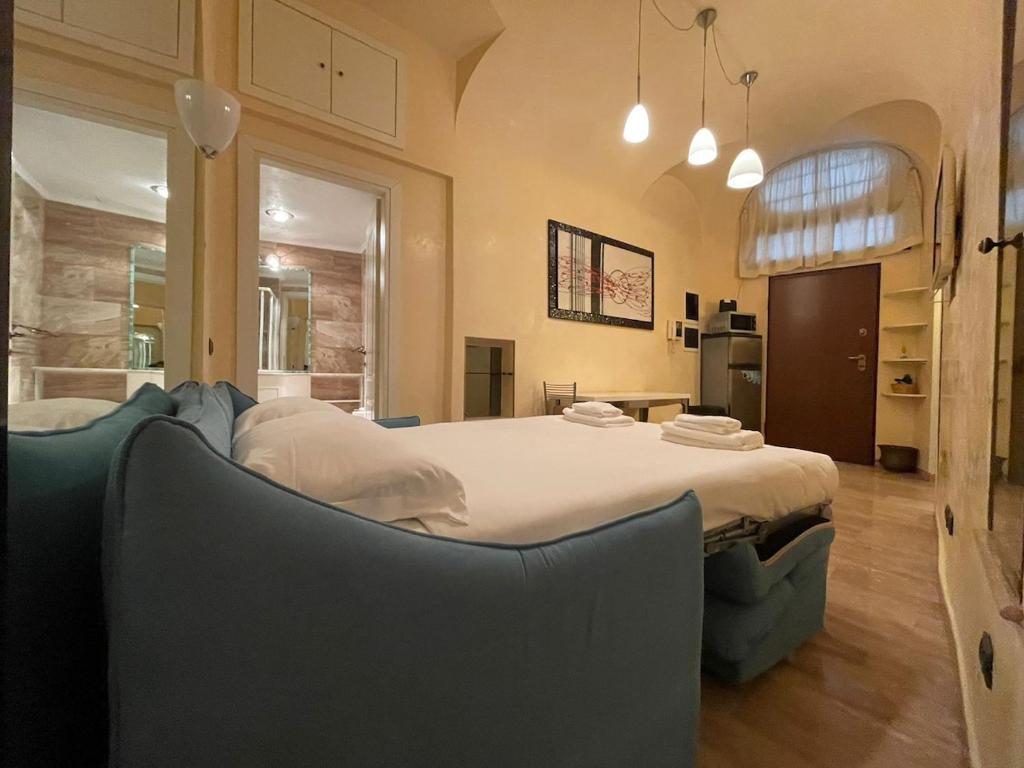 A bed or beds in a room at Piazza di Spagna Apartment