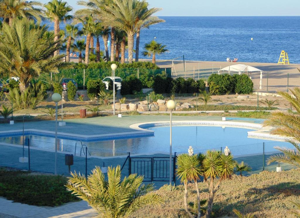 Πισίνα στο ή κοντά στο Apartamento dúplex en NaturaWorld
