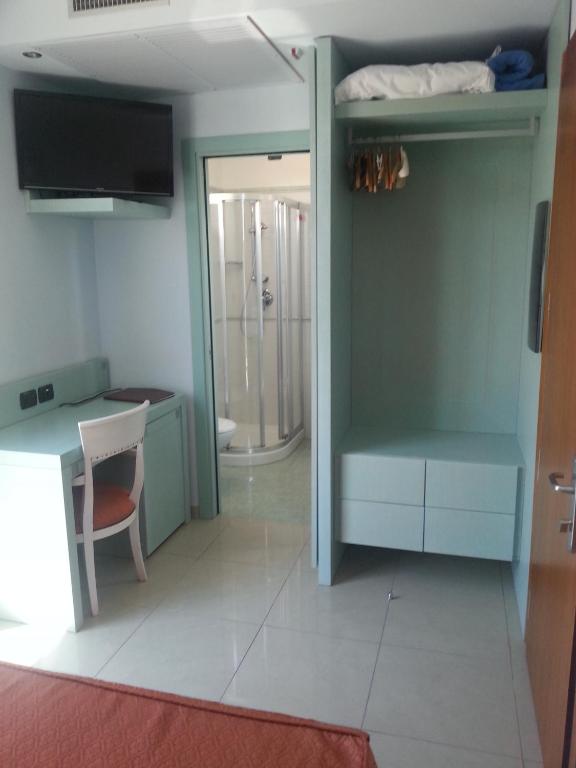 Postel nebo postele na pokoji v ubytování Hotel Eden Gigli