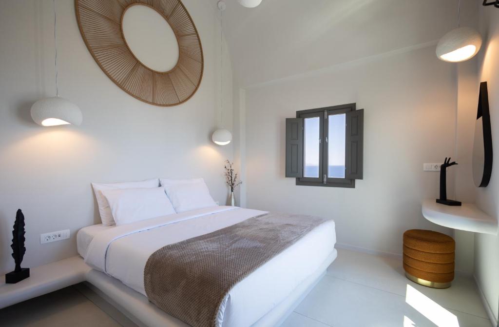 Postel nebo postele na pokoji v ubytování Niabelon Suites