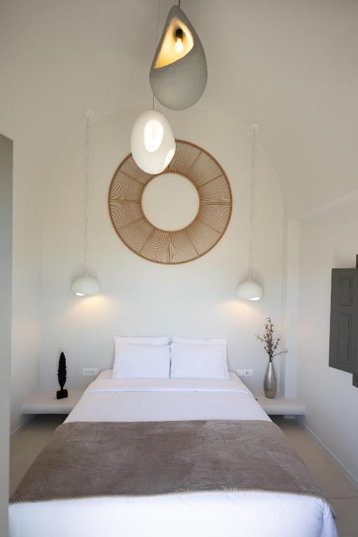 Postel nebo postele na pokoji v ubytování Niabelon Suites