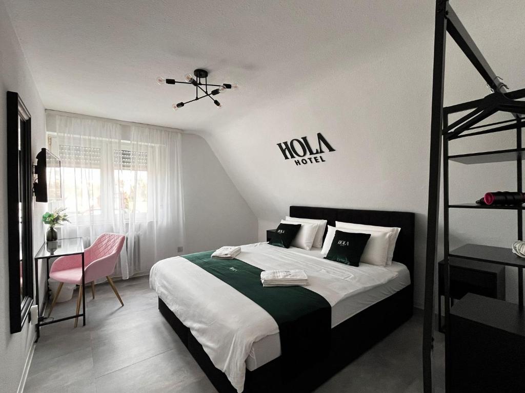 Postel nebo postele na pokoji v ubytování Hola Hotel Stuttgart