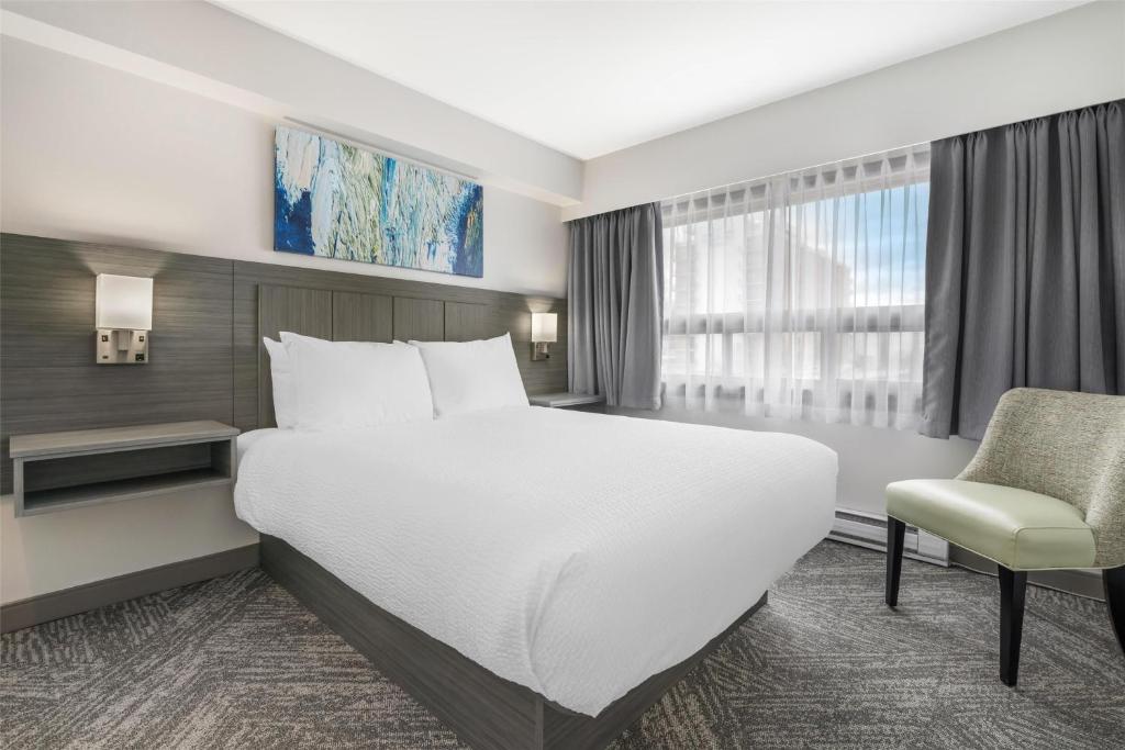 Postel nebo postele na pokoji v ubytování Best Western Prince George Downtown