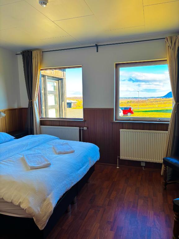 Postel nebo postele na pokoji v ubytování Brú Country Estate
