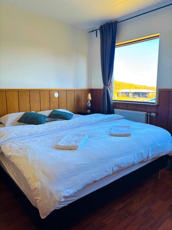 Postel nebo postele na pokoji v ubytování Brú Country Estate