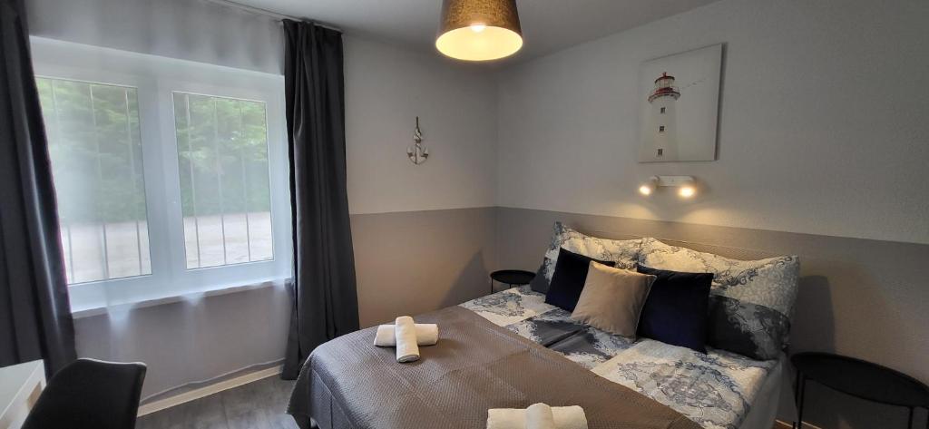 Postel nebo postele na pokoji v ubytování Doris Hotel
