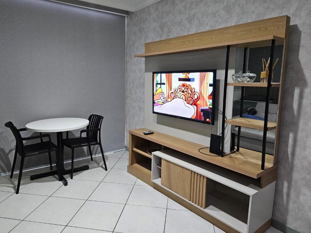 TV a/nebo společenská místnost v ubytování Flat Hotel Millennium