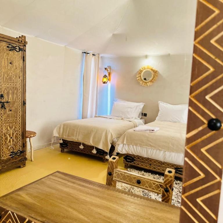 Postel nebo postele na pokoji v ubytování Luxury Spirit Camp