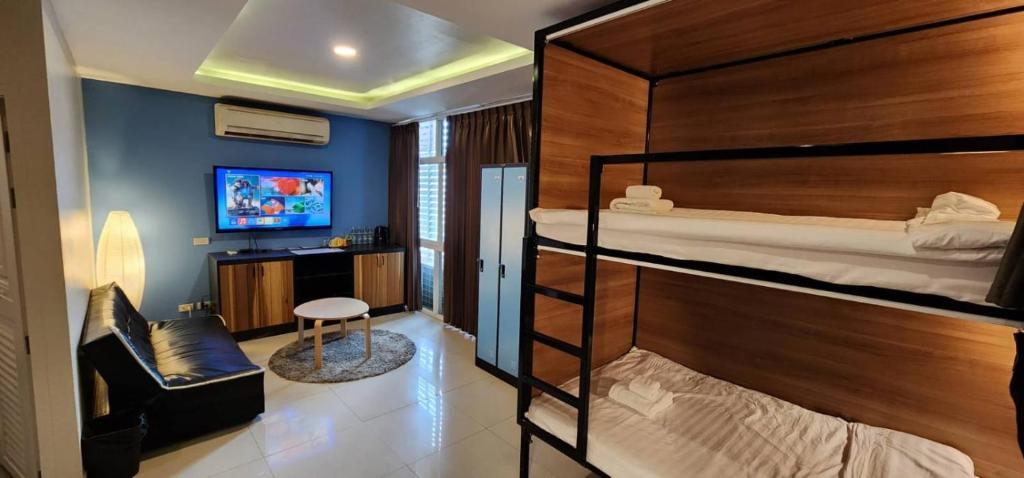 Postel nebo postele na pokoji v ubytování Lenny's Koh Samui